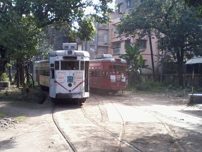 A Kolkata street scene with a heritage tram